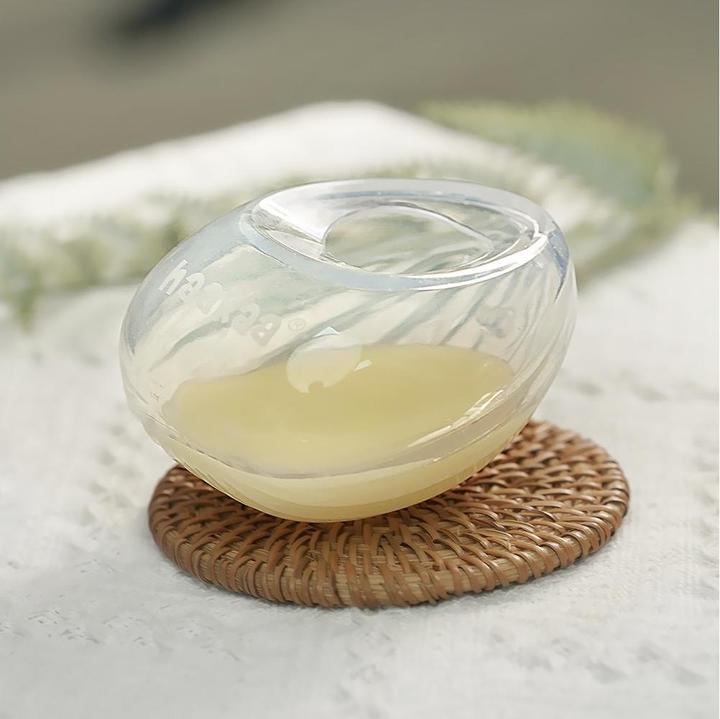 Image du produit Haakaa Tire-lait portable en forme de coquille 75ml