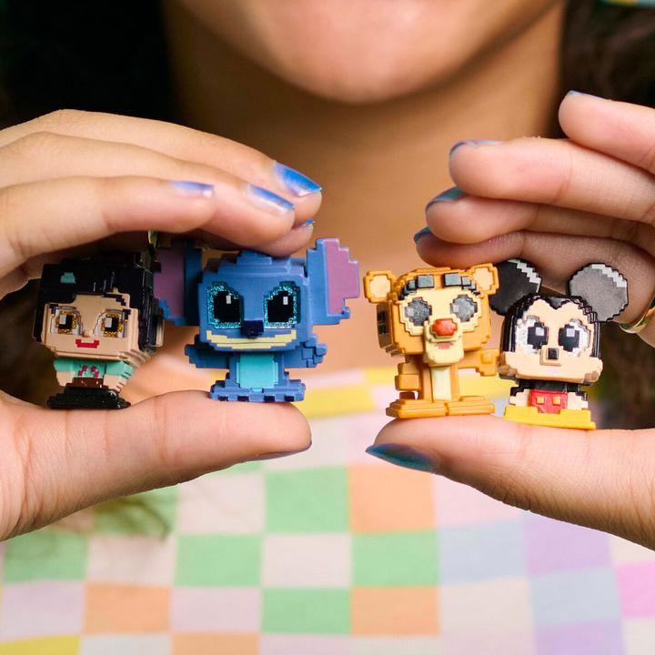Actual product image Disney Just Play Doorables Pixel Perfect Multi Peek, Surprise 1.5-inch Collectible Figurines Behind