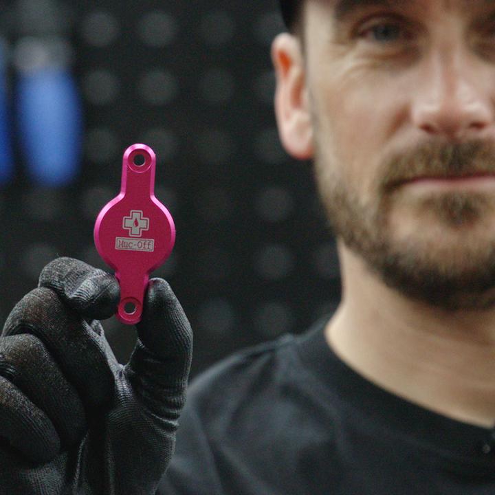Actual product image Muc-Off Secure Tag Holder