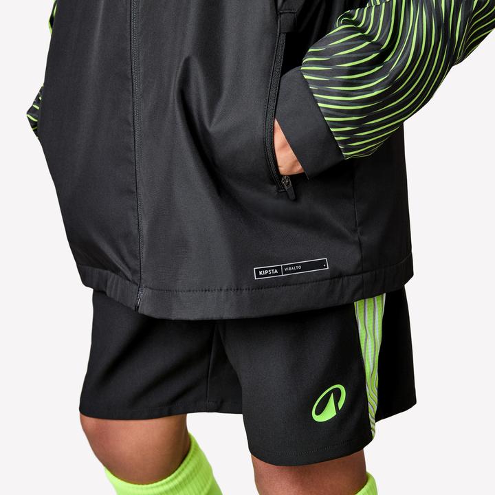 Immagine prodotto Kipsta Kinder Fussball Regenjacke - VIRALTO Wavy schwarz/neongelb (122)