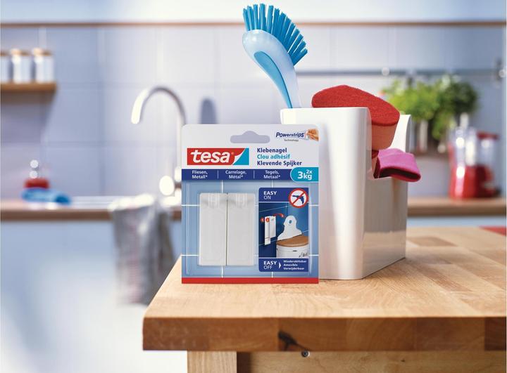 Produktbild tesa Klebenagel für Fliesen & Metall, 3kg Halteleistung, spurlos ablösbar & wiederverwendbar, 4 Nägel