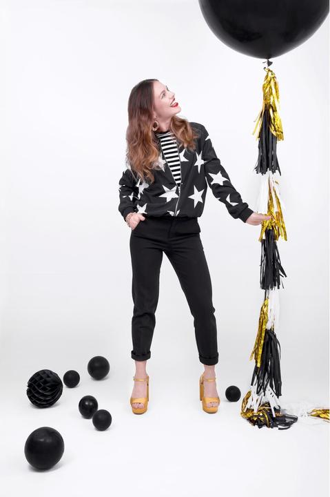 Immagine prodotto Partydeco Ghirlanda Pompons Nero e Oro
