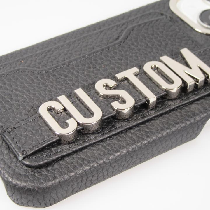 Immagine prodotto PhoneLook Copertina Copertina in pelle personalizzata con scritte in argento + cordino e scomparto per le (Apple iPhone 15)