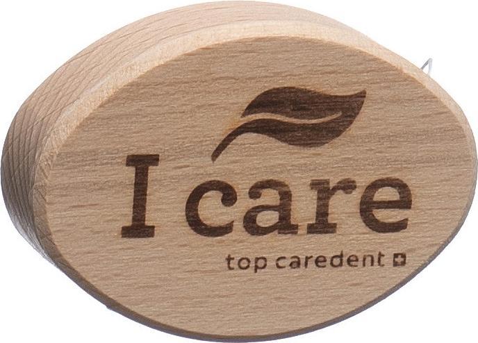 Image du produit Top Caredent Boîte à soie dentaire en bois avec soie dentaire naturelle cardamom & cire d'abeille (25 m)