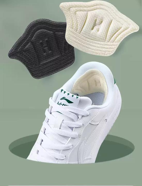 Immagine prodotto Stride Solette antiscivolo per talloni - Morbidi cuscinetti massaggianti per scarpe da ginnastica neri