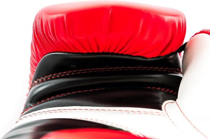 Immagine prodotto UFC Guanto da allenamento per il fitness (14 OZ)