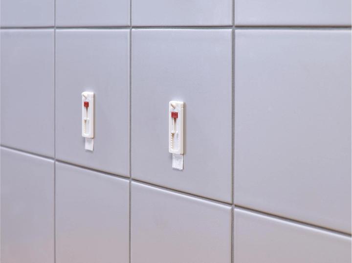 Immagine prodotto tesa Piastrelle con chiodi adesivi regolabili in altezza