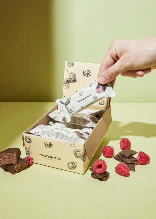 Produktbild KoRo Veganer Bio Proteinriegel mit Himbeergeschmack und dunklem Schokoladenüberzug (1 Stk., 600 g)