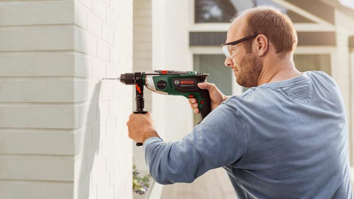 Produktbild Bosch Home & Garden AdvancedImpact 900 (Netzbetrieb)