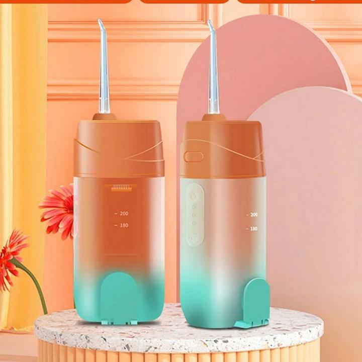 Actual product image OEM Consumer electronics Electric oral irrigator 200 ml 4 tips RC-K-563 orange
