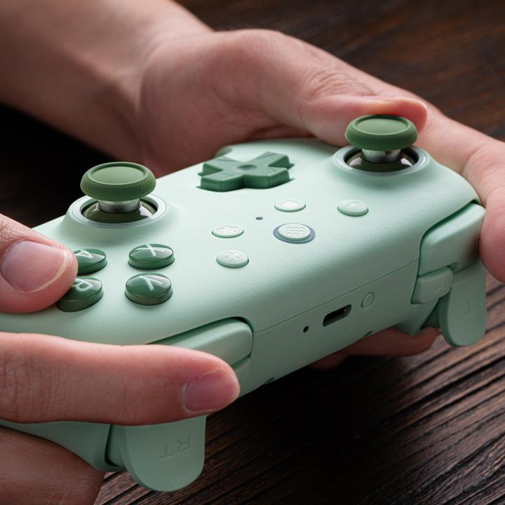 Actual product image 8bitdo Ultimate 2C Wireless (peach/light yellow, for Windows & Android) (Android, Windows)