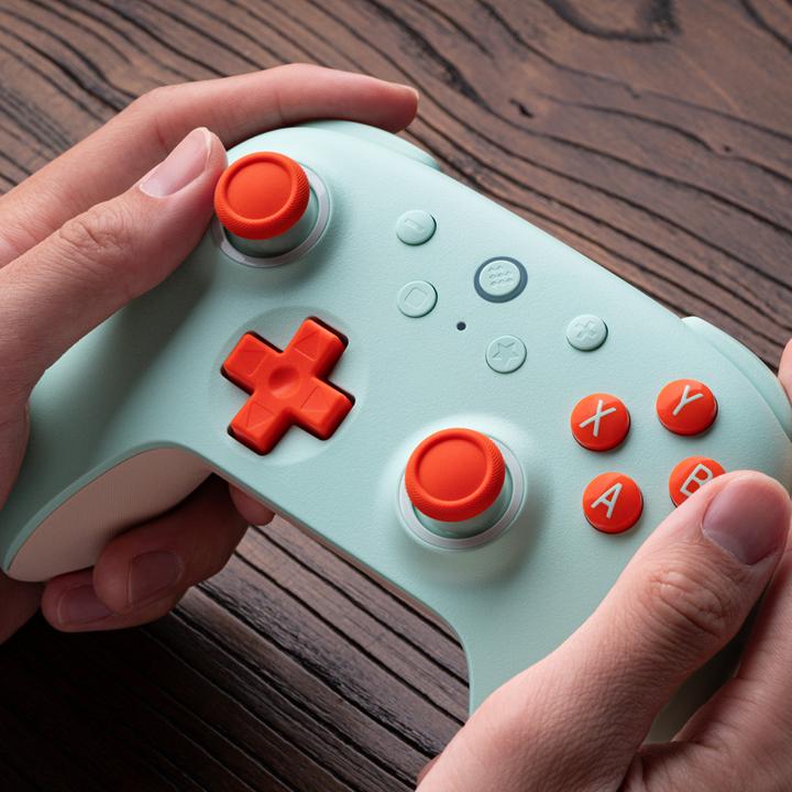 Actual product image 8bitdo Ultimate 2C Wireless (peach/light yellow, for Windows & Android) (Android, Windows)