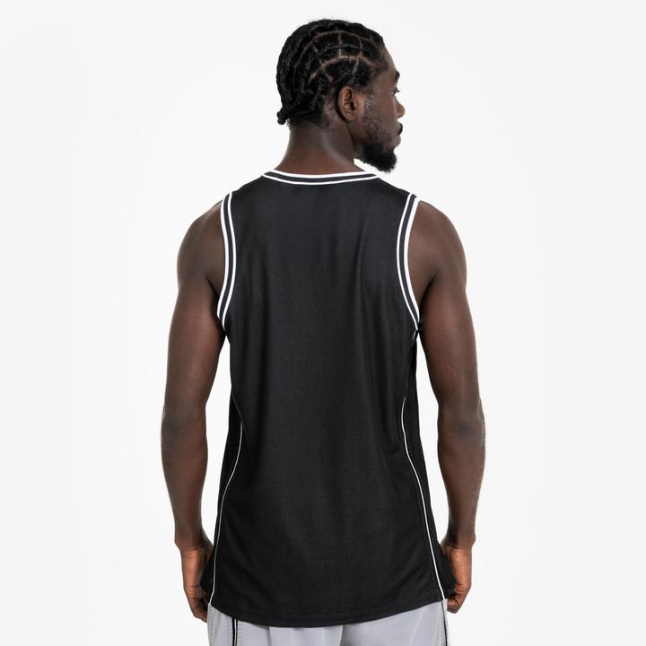 Kipsta Damen/Herren Basketball Trikot wendbar leicht - SHR 500 schwarz-weiss
