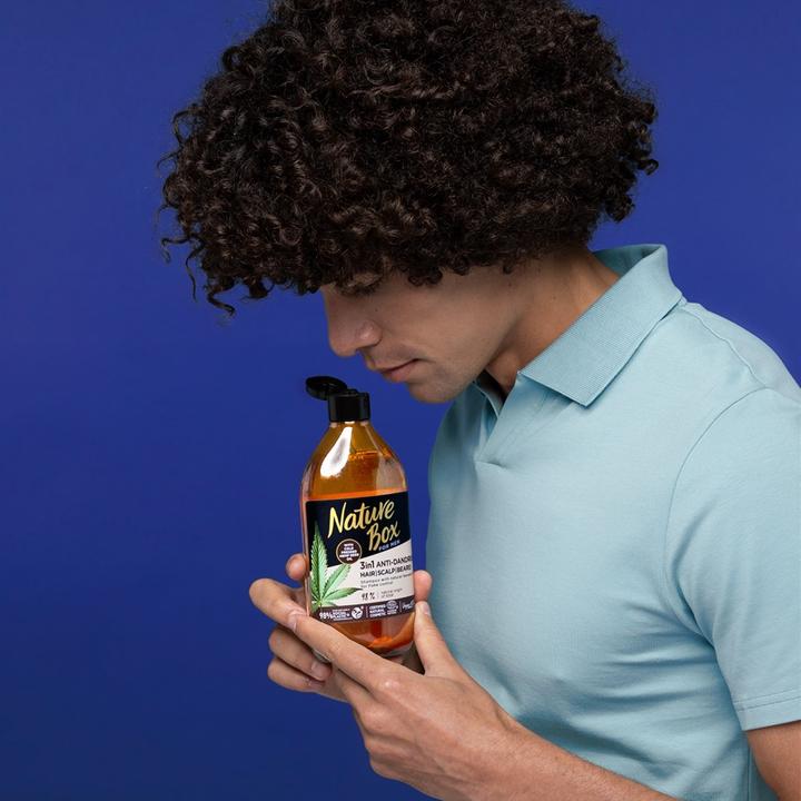 Produktbild Nature Box 3in1 Anti-Schuppen (385 ml, Flüssiges Shampoo)