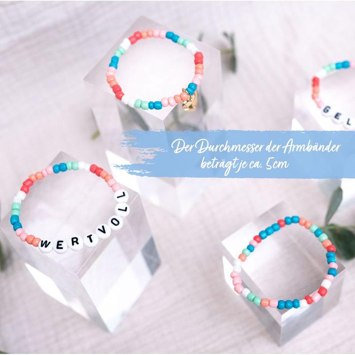 Produktbild Papierdrachen 4 Perlenarmbänder – GELIEBT und WERTVOLL (Kunststoff, Metall, Gummi)