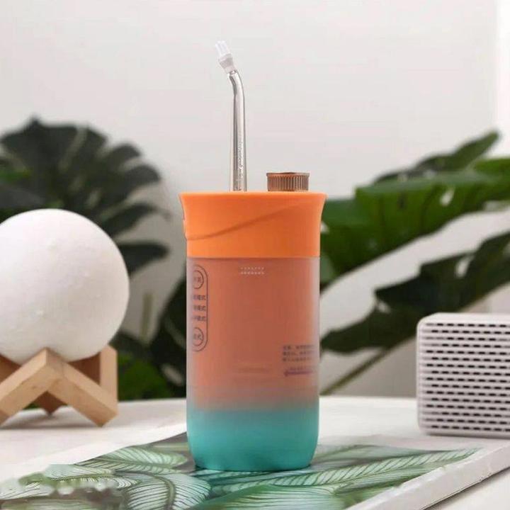 Actual product image OEM Consumer electronics Electric oral irrigator 200 ml 4 tips RC-K-563 orange