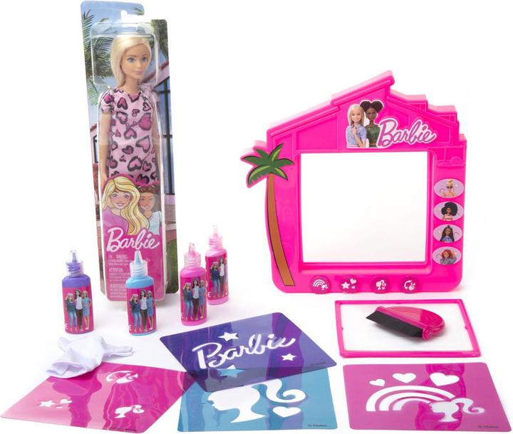 Barbie fashion designer with Barbie doll