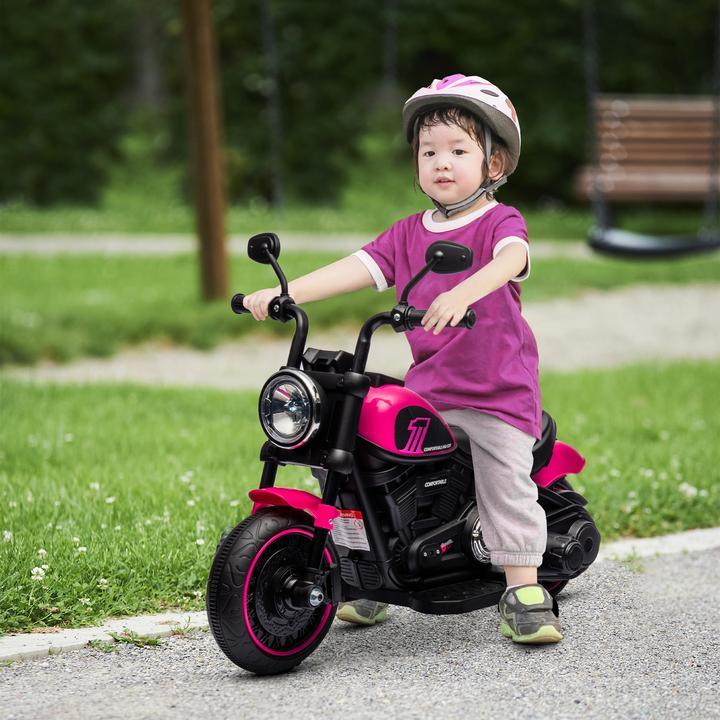 Immagine prodotto Swisshandel24 Moto elettrica per bambini, 2 ruote di allenamento rimovibili, 1,5-3 km/h, per 1,5-3 anni Rosa (6 V)
