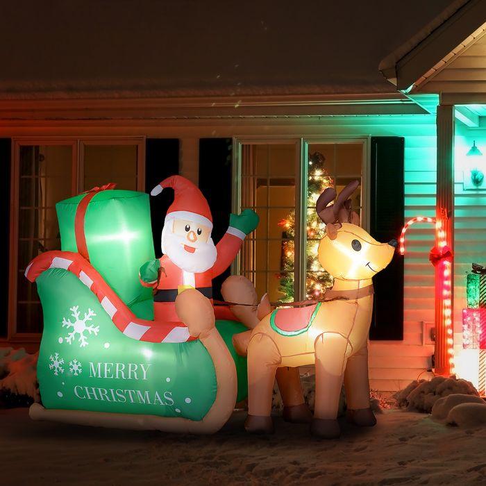 Immagine prodotto Swisshandel24 Aufblasbar Weihnachtsdeko, 2,1 m Weihnachtsmann mit Schlitten & Rentier