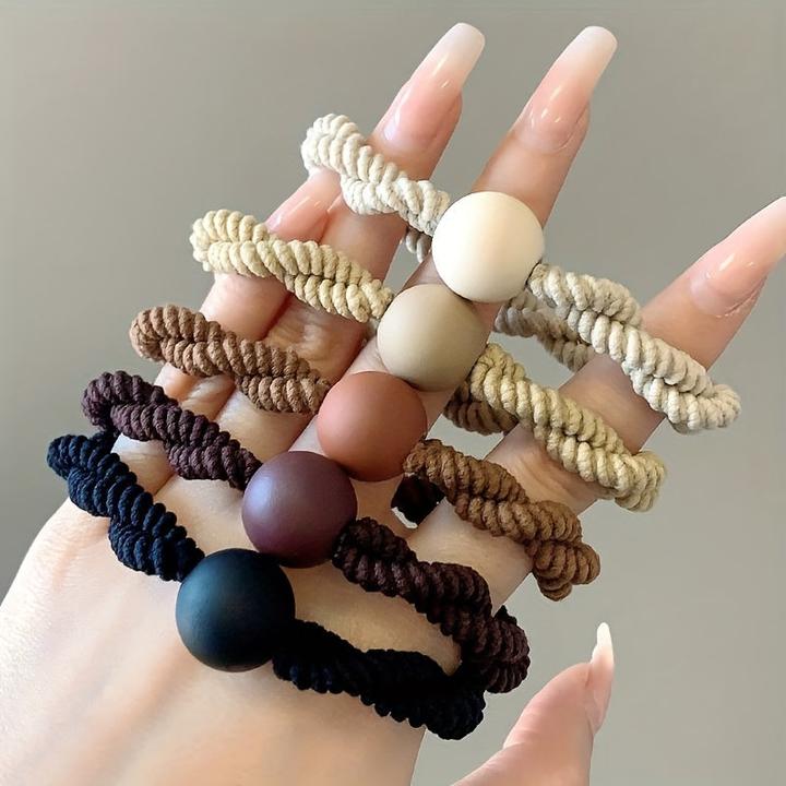 Immagine prodotto Activity Board Elegantes 40-teiliges Haargummi-Set - hohe Elastizität, strapazierfähiger Stoff, gemischte Farben | (40 pz.)