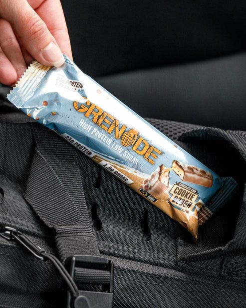 Immagine prodotto Grenade Barretta iperproteica al cioccolato con impasto di biscotti (Biscotto, Torrone, Cioccolato, Caramel, 1 pz., 60 g)
