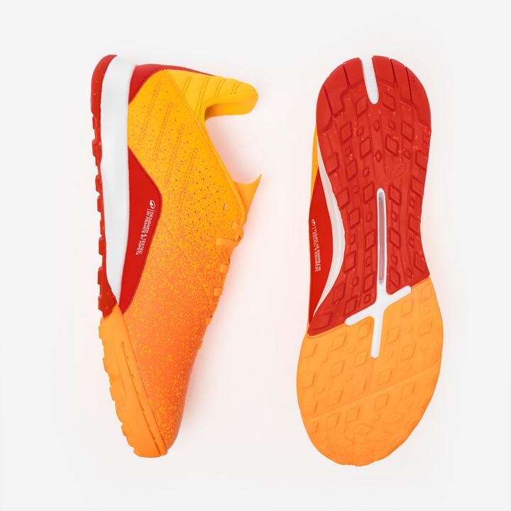 Immagine prodotto Kipsta Damen/Herren Fussball Multinockenschuhe Turf - Viralto I TF orange (47)