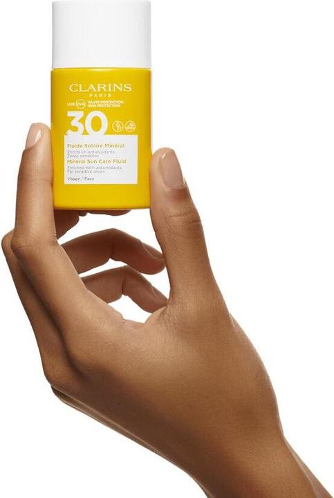 Actual product image Clarins Sun - Fluide Solaire Minéral Visage SPF30 (Sun cream face, SPF 30, 30 ml, 62 g)
