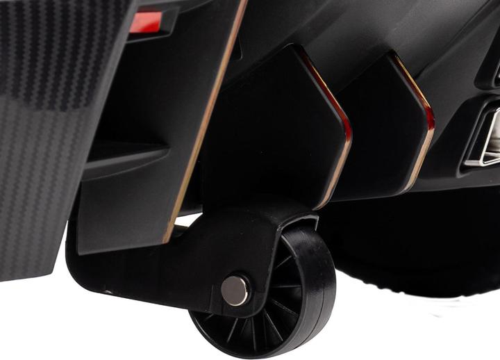 Immagine prodotto Swisshandel24 Lamborghini Kinderauto, pink, Fernbedienung, Bluetooth, 30kg Belastbarkeit (12 V)