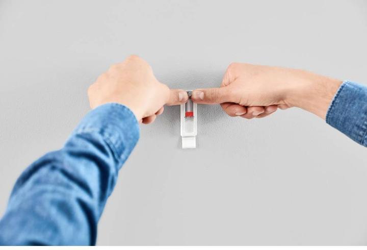 Actual product image tesa Adhesive nail for wallpaper & plaster, ideal for WLAN routers, height and side-adjustable
