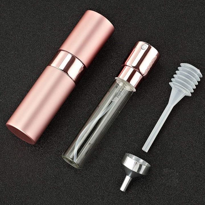 Produktbild Swissdetector Wiederbefüllbarer Parfümzerstäuber - Aluminium 8 ml drehbar mit verstecktem Deckel - Pink